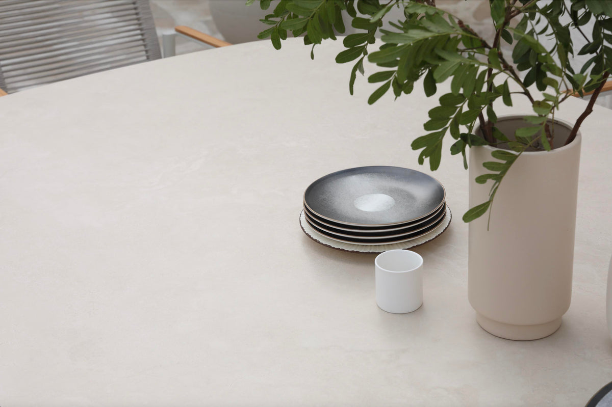 Venus sculptural beige ceramic outdoor dining table – close-up detail (2)