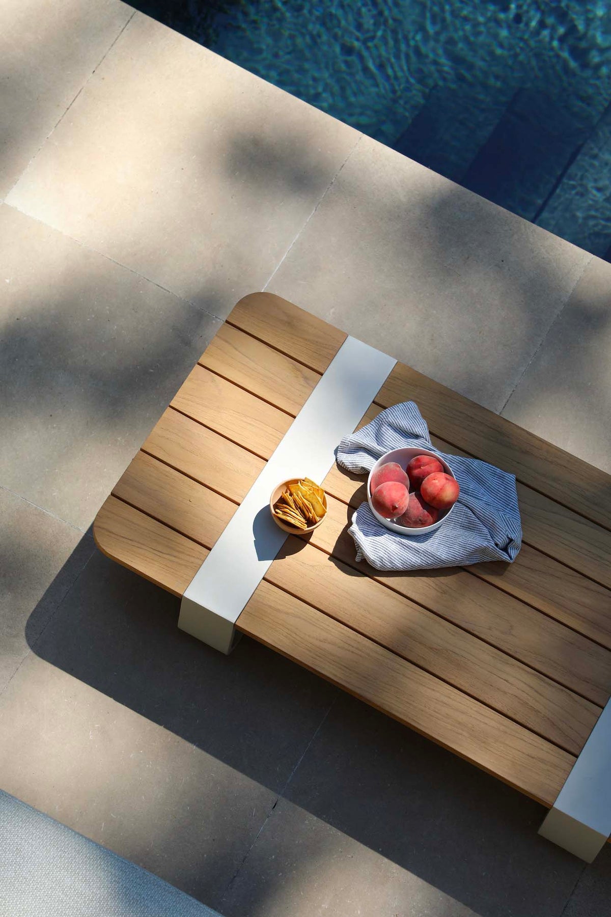 Romeo Mini modular aluminum and teak bench set with carved teak armrests – shown outdoors (6)