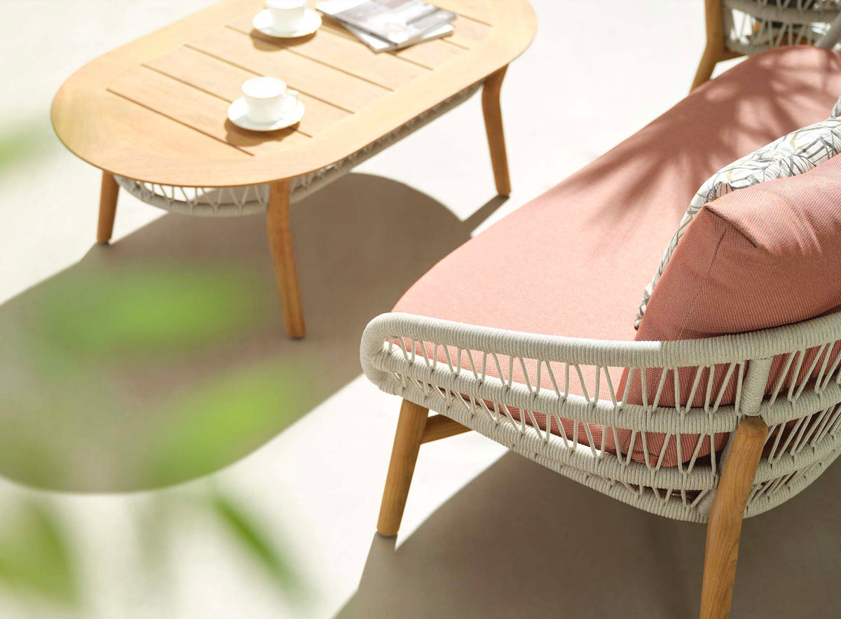 Rose teak and rope patio set with powder pink cushions – close-up detail