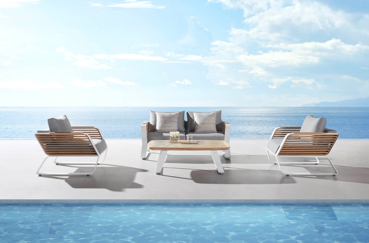 Aily Mini aluminum and teak patio loveseat set with two armchairs – shown outdoors (5)