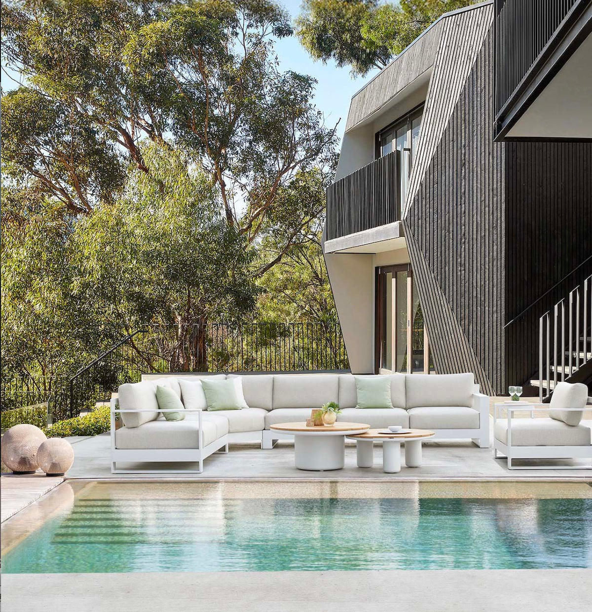 Iris 7-seat white modular aluminum outdoor sectional – shown outdoors