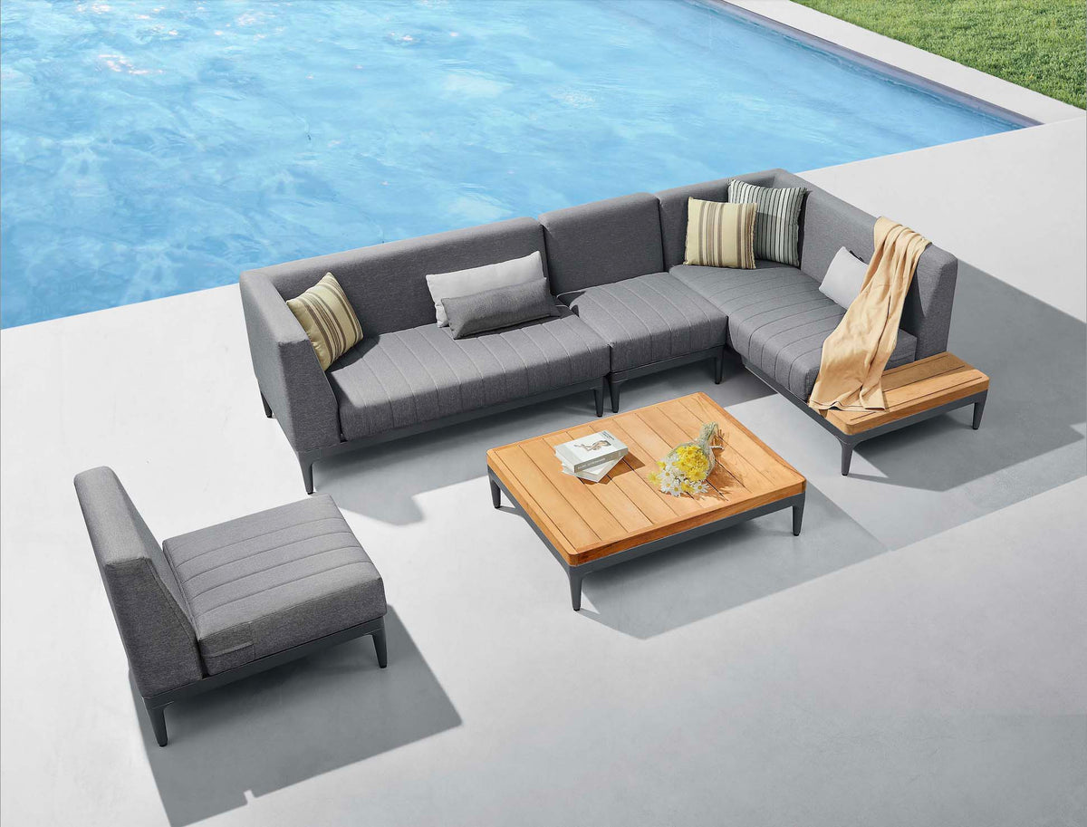 Sira Mini compact anthracite aluminum and teak outdoor sectional – shown outdoors (3)