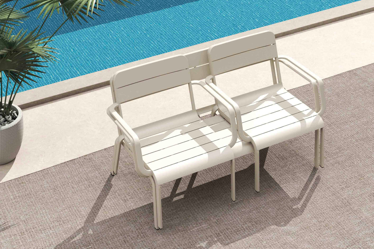 Joy stackable aluminum patio set in beige with loveseat and armchairs – shown outdoors (7)