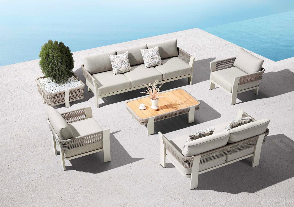 Olby XL 7-seat rope patio sofa set with teak coffee table – shown outdoors (4)