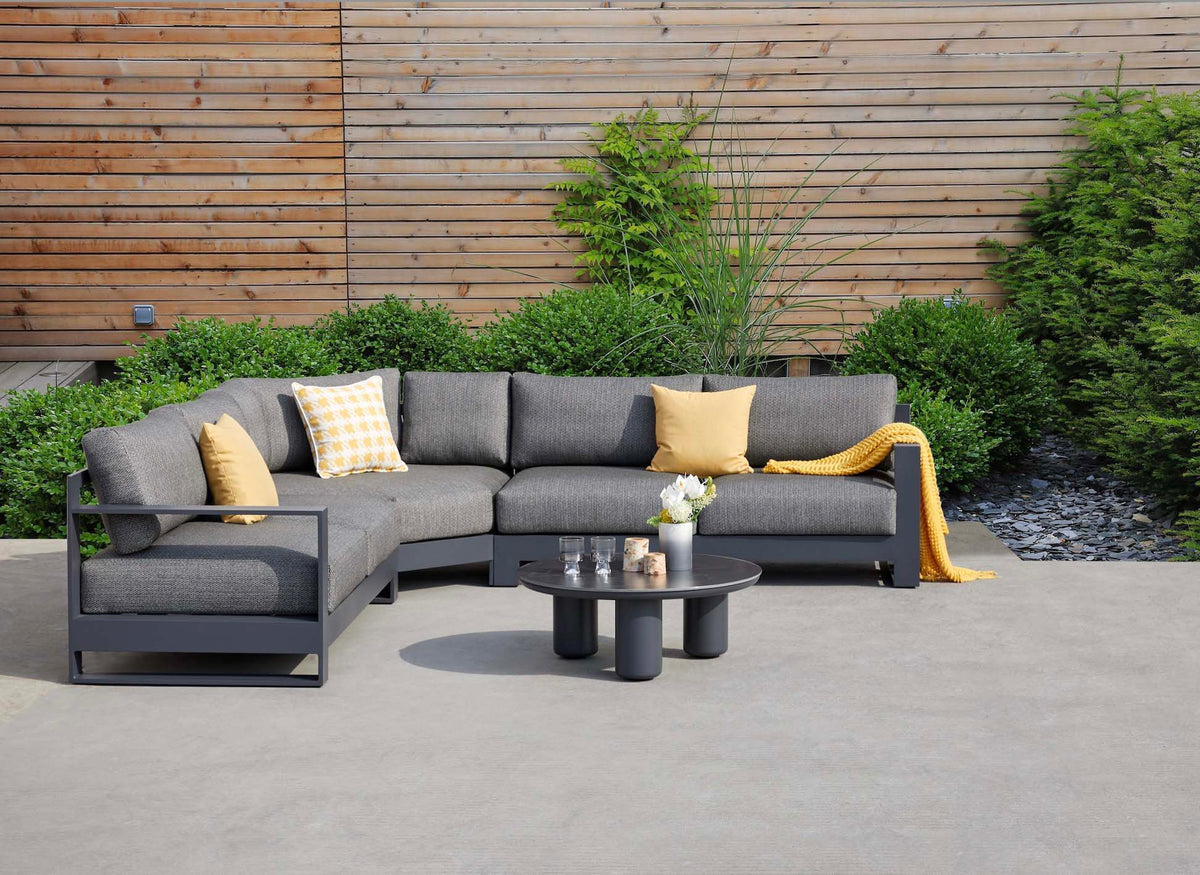 Iris Mini small aluminum outdoor sectional with ceramic coffee table – shown outdoors (3)