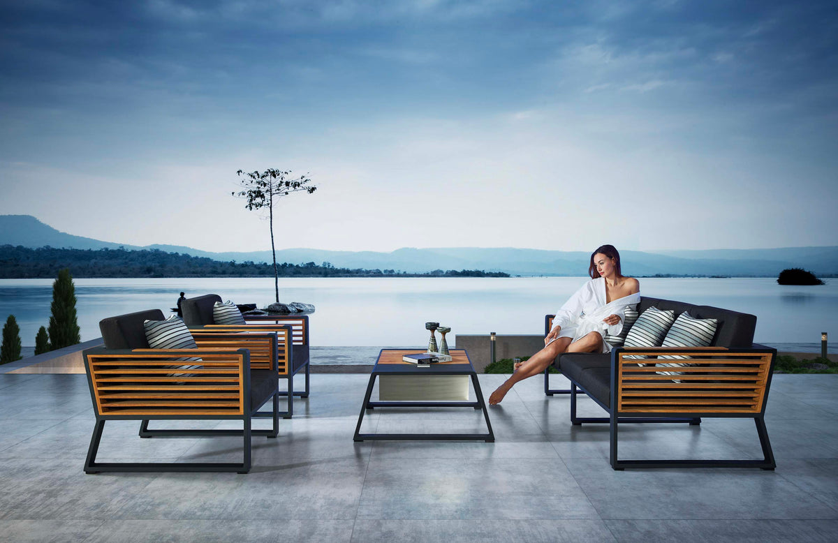 Cofy Bis aluminum patio set with teak and aluminum coffee table with drink cooler – shown outdoors (5)