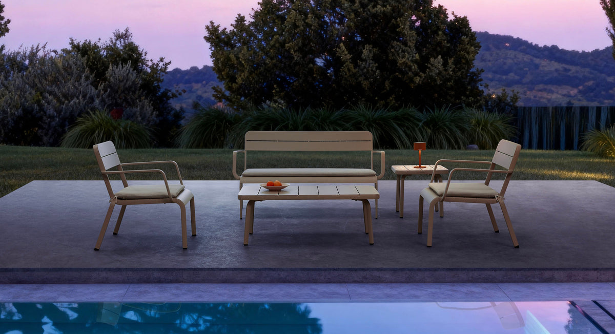 Joy stackable aluminum patio set in beige with loveseat and armchairs – shown outdoors (3)