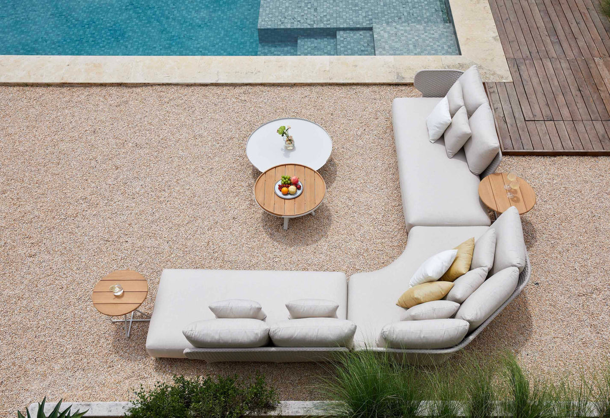 Charly rounded rope outdoor sectional with coffee and side tables – shown outdoors (7)