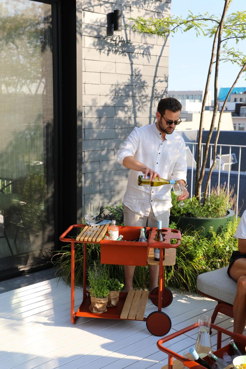 Sunny red aluminum outdoor bar cart with cooler – shown outdoors (3)