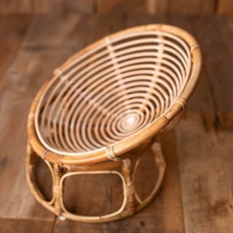 Rattan and bamboo baby armchair – shown in a room setting