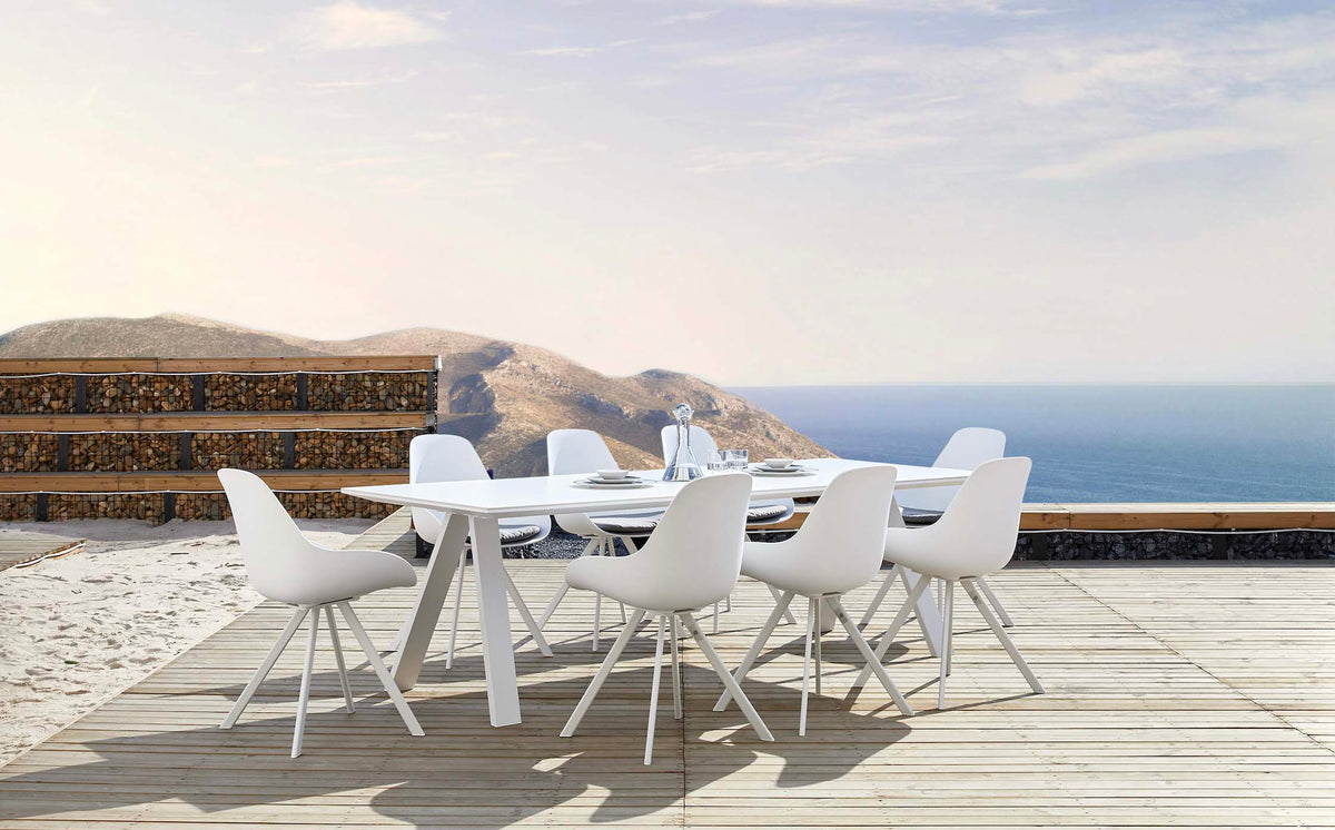 Mondo white ceramic outdoor dining table with X legs, 240 cm – shown outdoors (3)