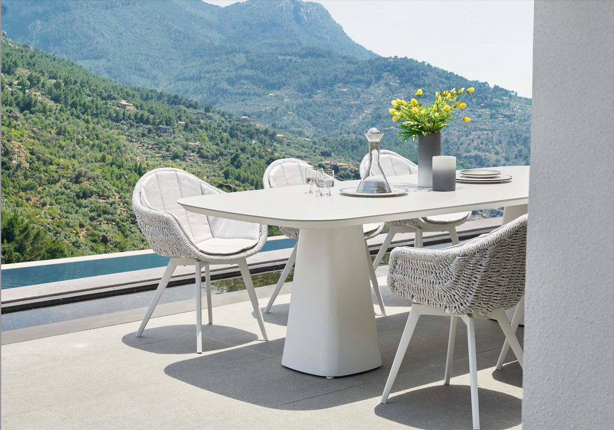Milo aluminum ceramic-top outdoor dining table for eight – shown outdoors (4)