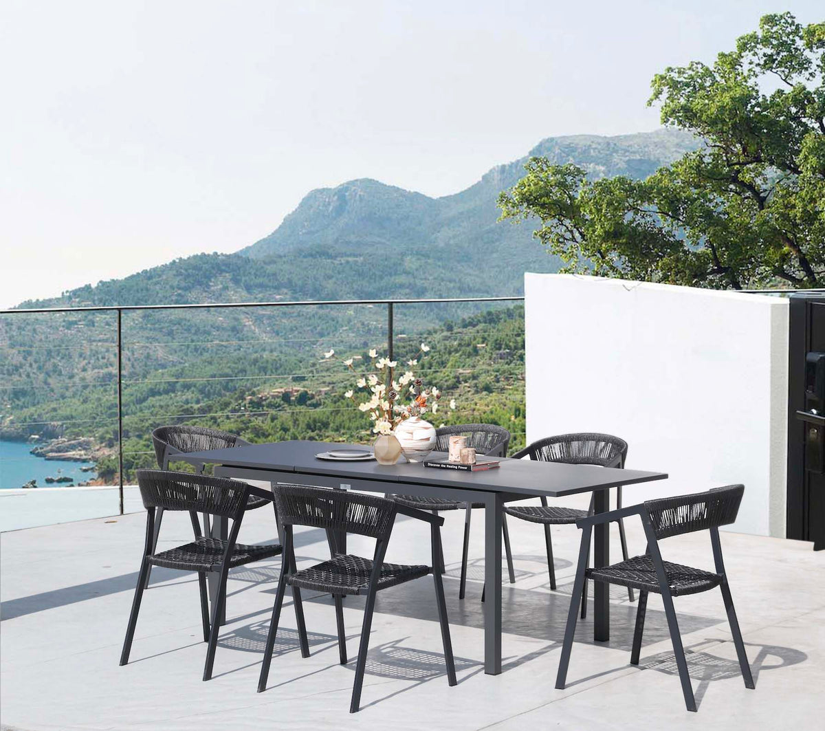 Lou Mini black extendable aluminum outdoor table – shown outdoors (2)
