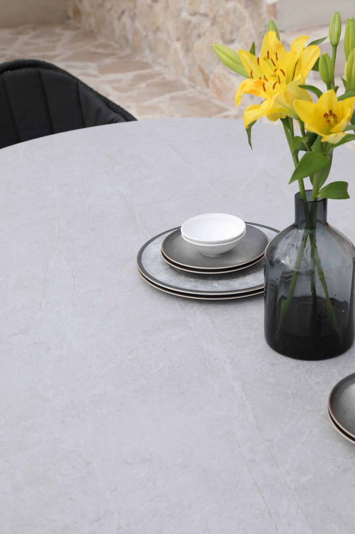 Ambre oval marble-effect ceramic outdoor dining table – close-up detail