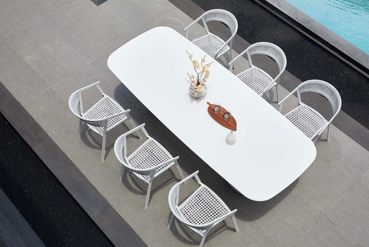 Milo aluminum ceramic-top outdoor dining table for eight – shown outdoors (5)