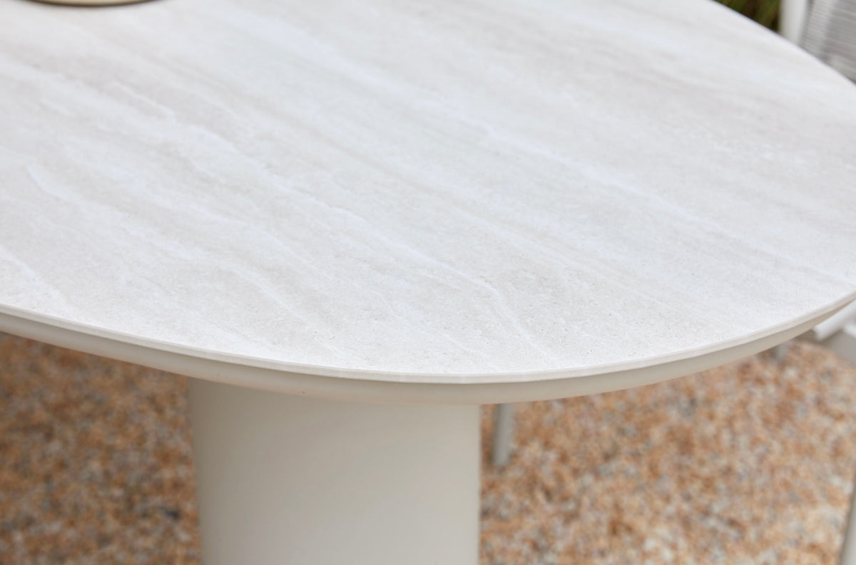 Lyse round ceramic outdoor dining table with three legs – close-up detail