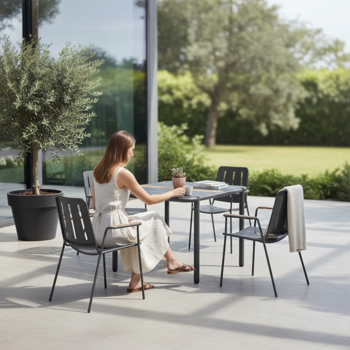 Sarran black square aluminum restaurant table – shown outdoors (2)