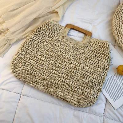 Woven straw tote with varnished wooden handles – beige variant
