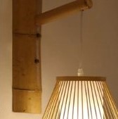 Oval openwork handwoven rattan wall sconce – close-up detail