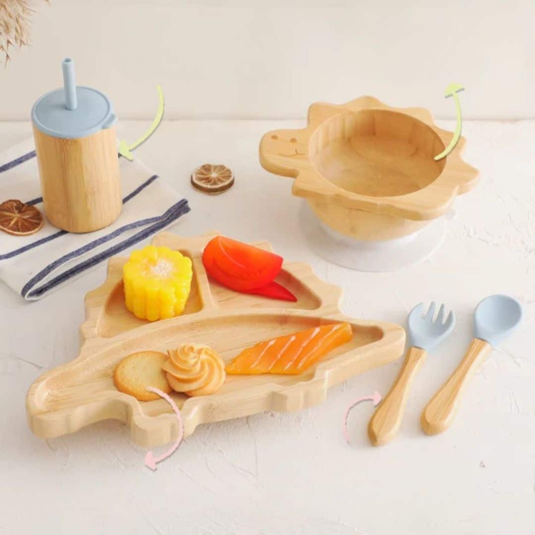 Dinosaur-shaped bamboo baby plate – shown in a room setting