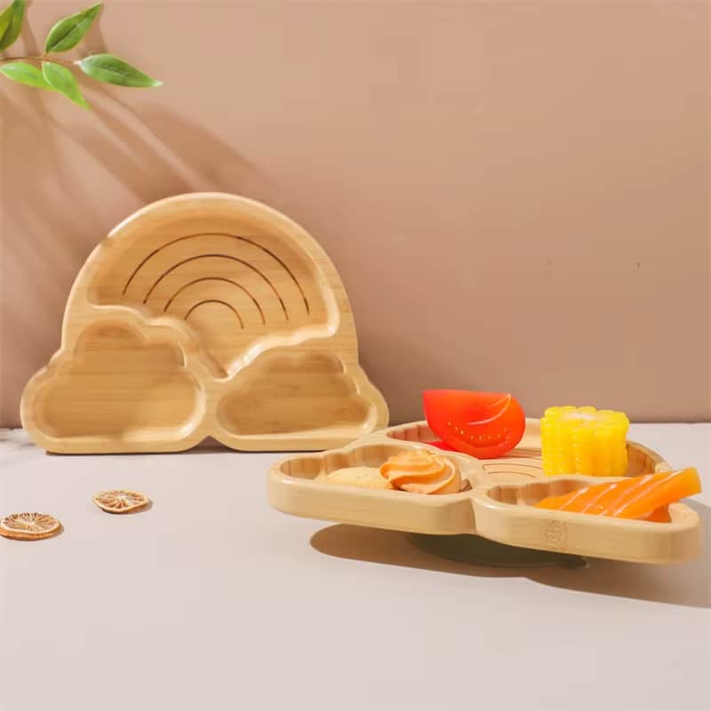 Bamboo baby plate with a silicone suction base – shown in a room setting