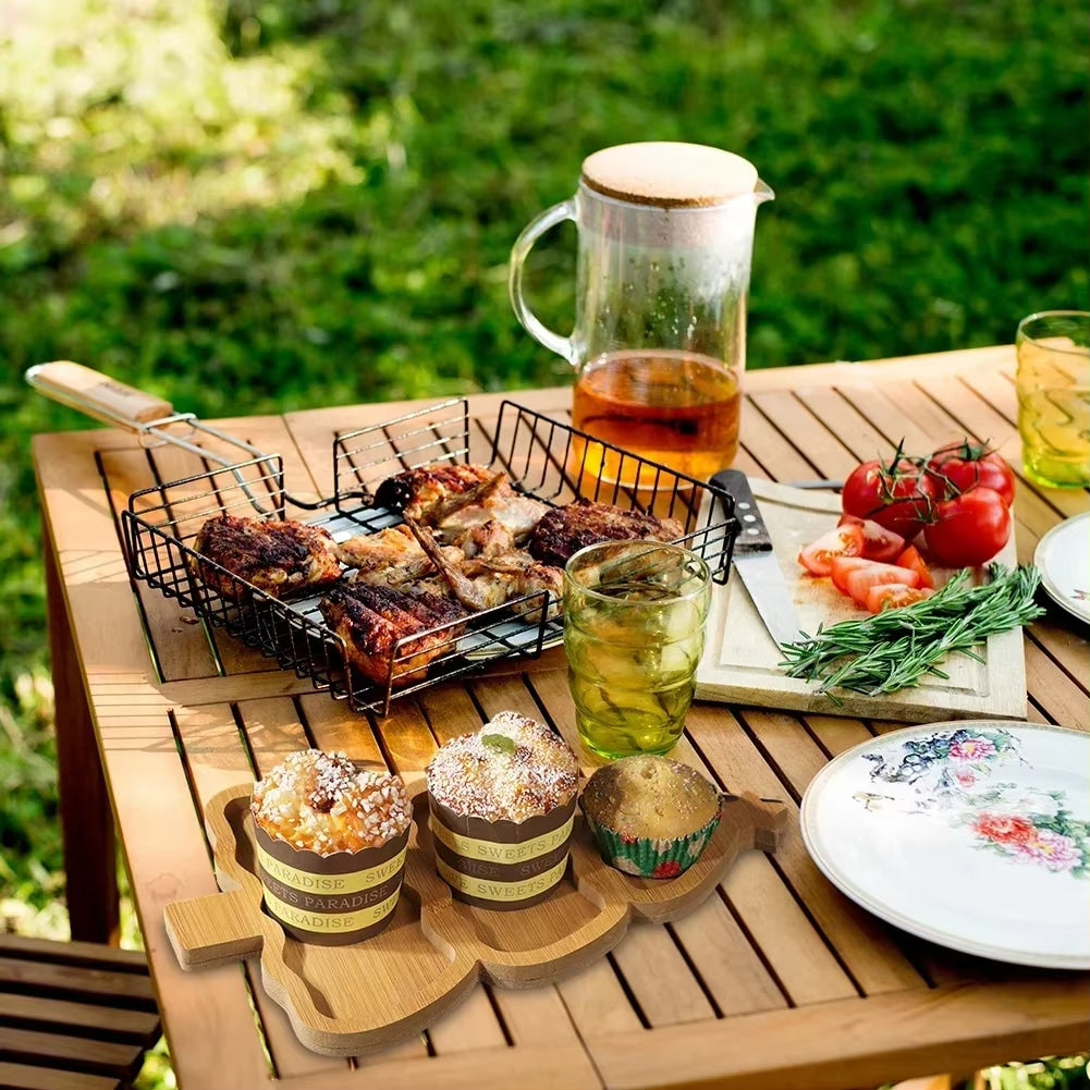 Christmas tree-shaped bamboo plate with visible grain – shown outdoors