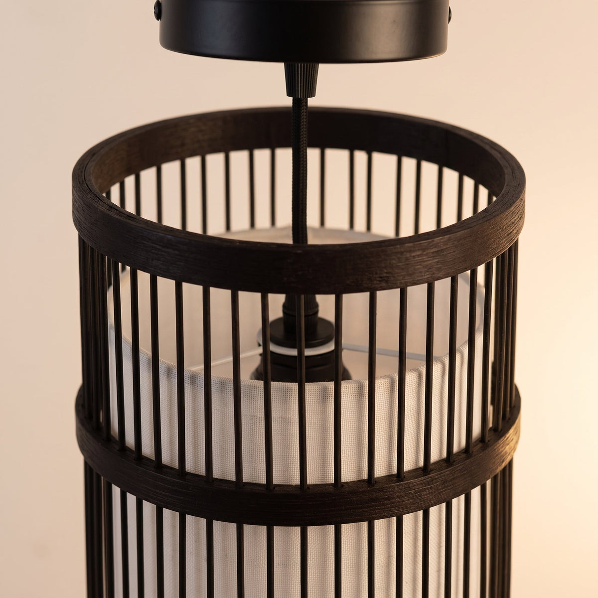 Black bamboo cylinder pendant light – close-up detail