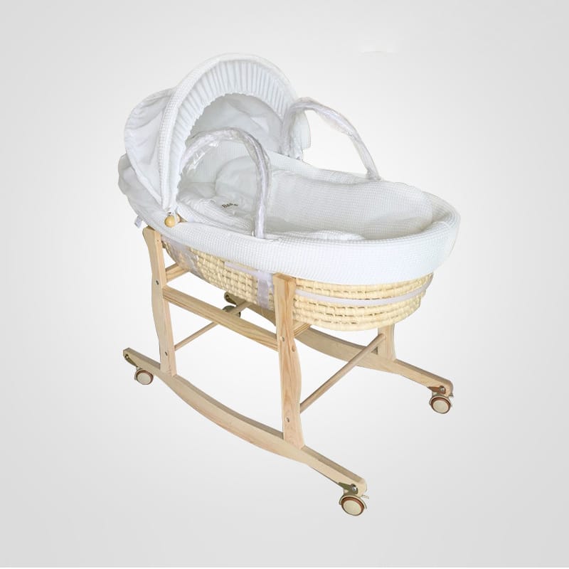Hand-braided rattan bassinet on wheels