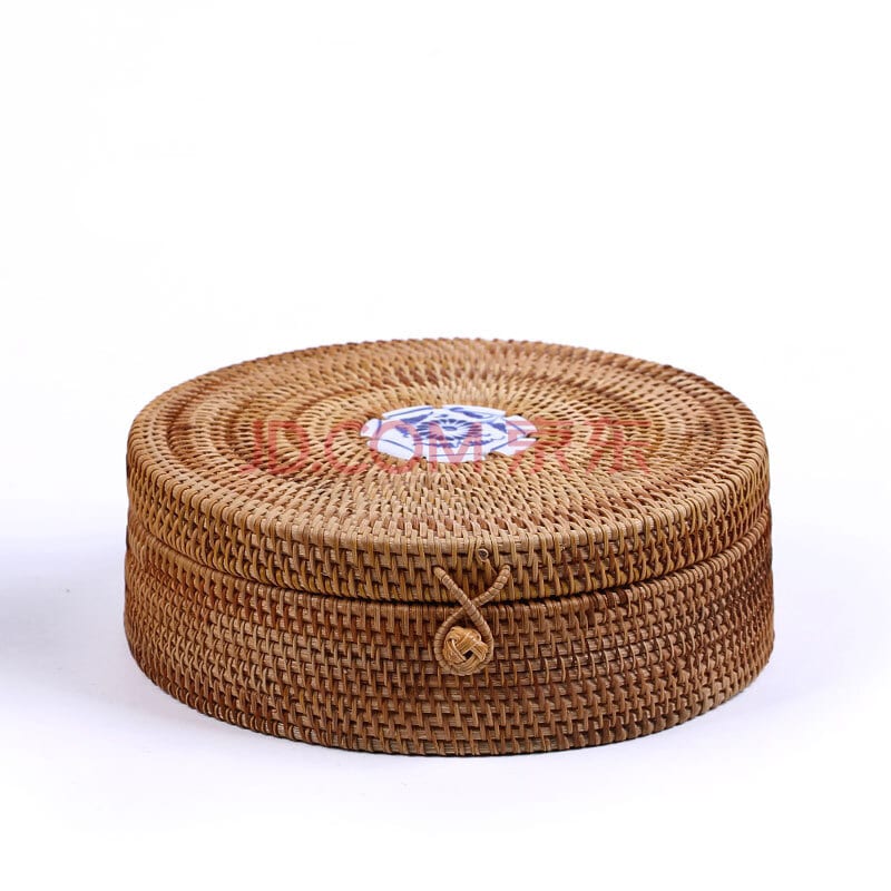 Handwoven rattan box with an Andalusian-style hand-painted ceramic lid
