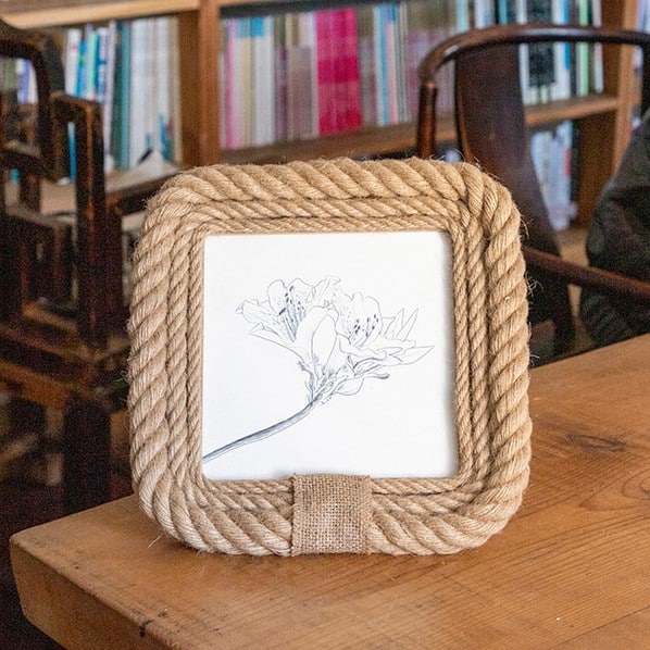 Square hemp and hand-braided rattan photo frame – shown in a room setting