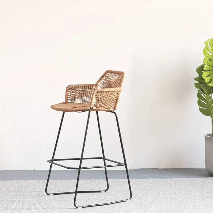 Scandinavian rattan bar stool with a hand-braided seat