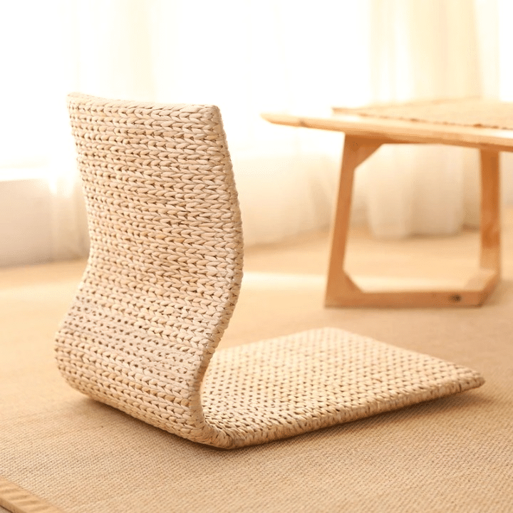 Modern Japanese-style wicker chair in natural beige – shown in a room setting