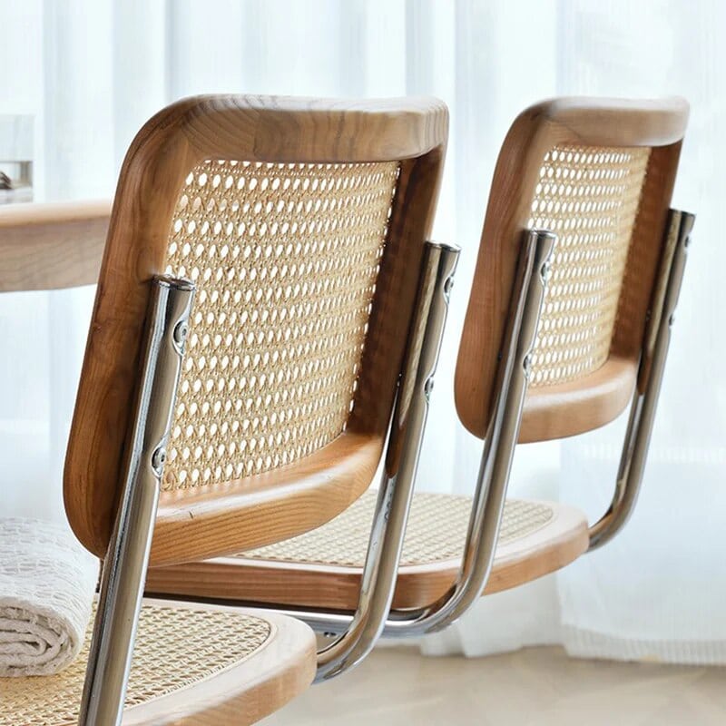 Ergonomic round rattan chair with a high hand-braided back – multiple views