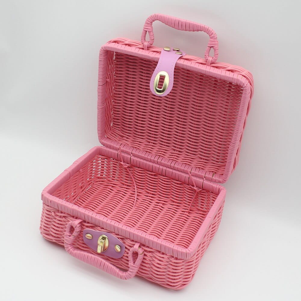 Pink retro suitcase-style rattan toy box