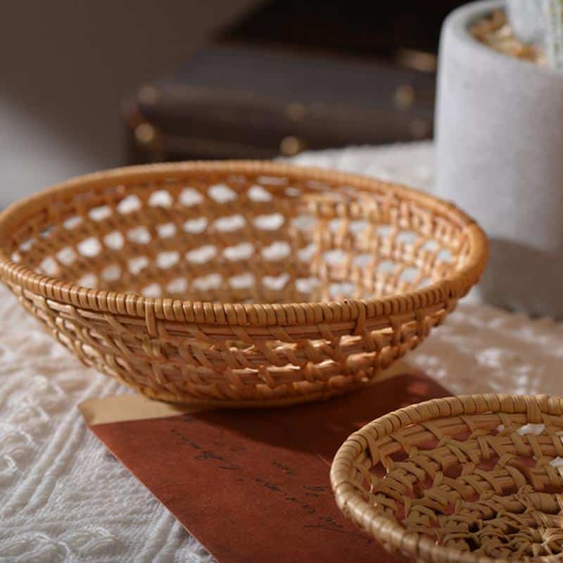 Round handwoven rattan bread and serving basket – shown in a room setting (4)