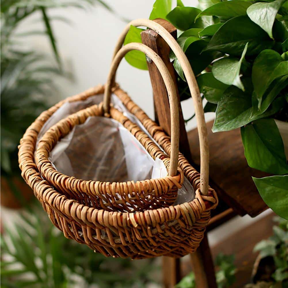 Handwoven natural rattan hanging plant basket – shown outdoors (2)