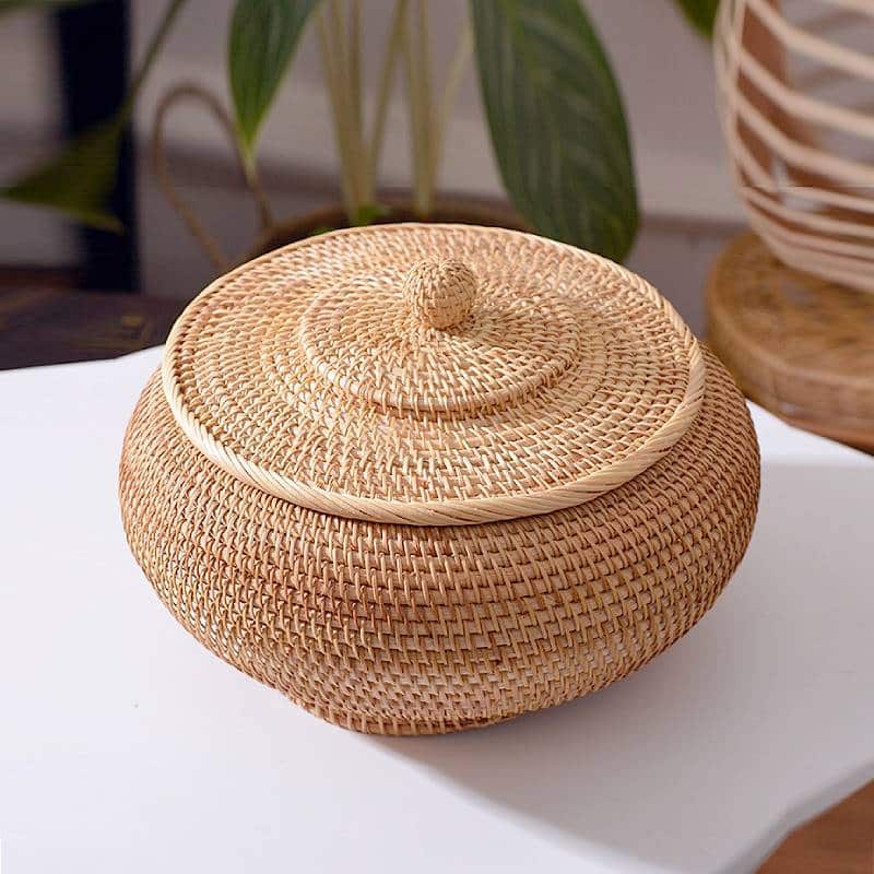 Round handwoven rattan basket with a fitted lid