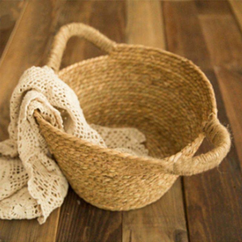 Round hand-braided rattan moses basket – shown in a room setting (2)