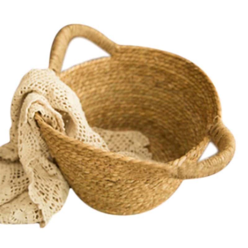 Round hand-braided rattan moses basket – shown in a room setting