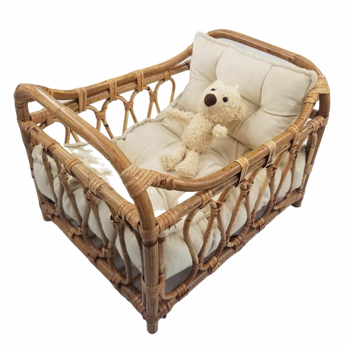 Openwork handwoven rattan moses basket – shown in a room setting