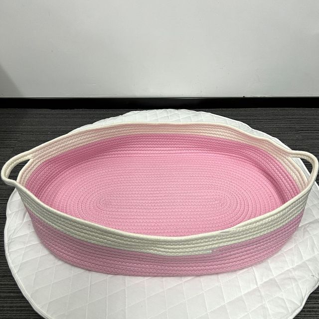 Pink and white synthetic rattan moses basket – another view
