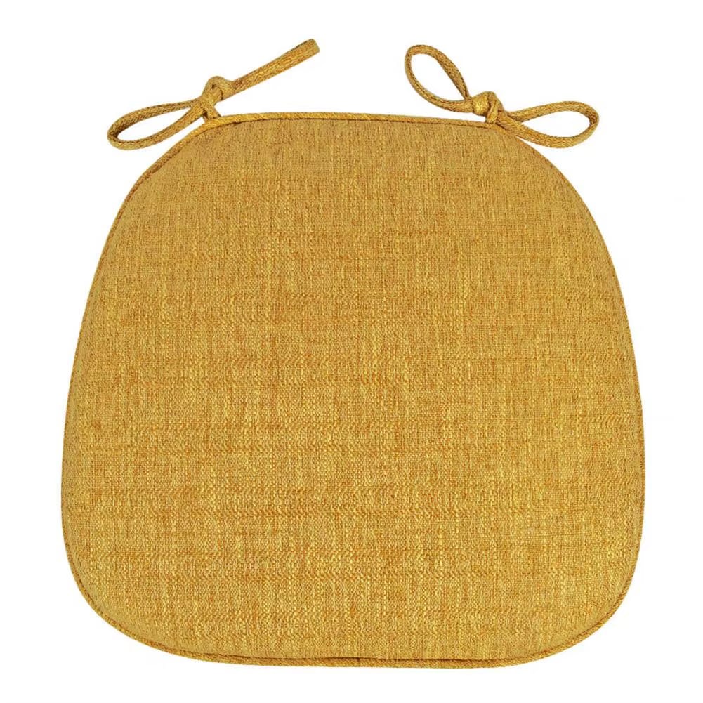 Yellow padded chair cushion for a rattan seat