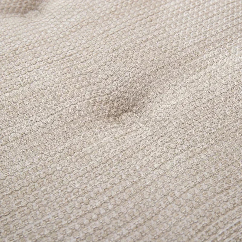 Nordic beige cushion shaped for a rattan armchair – close-up detail