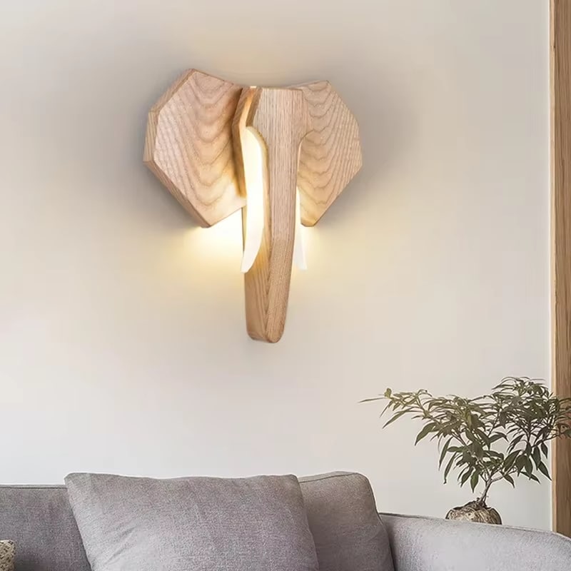 Carved wooden elephant head wall decor – shown in a room setting