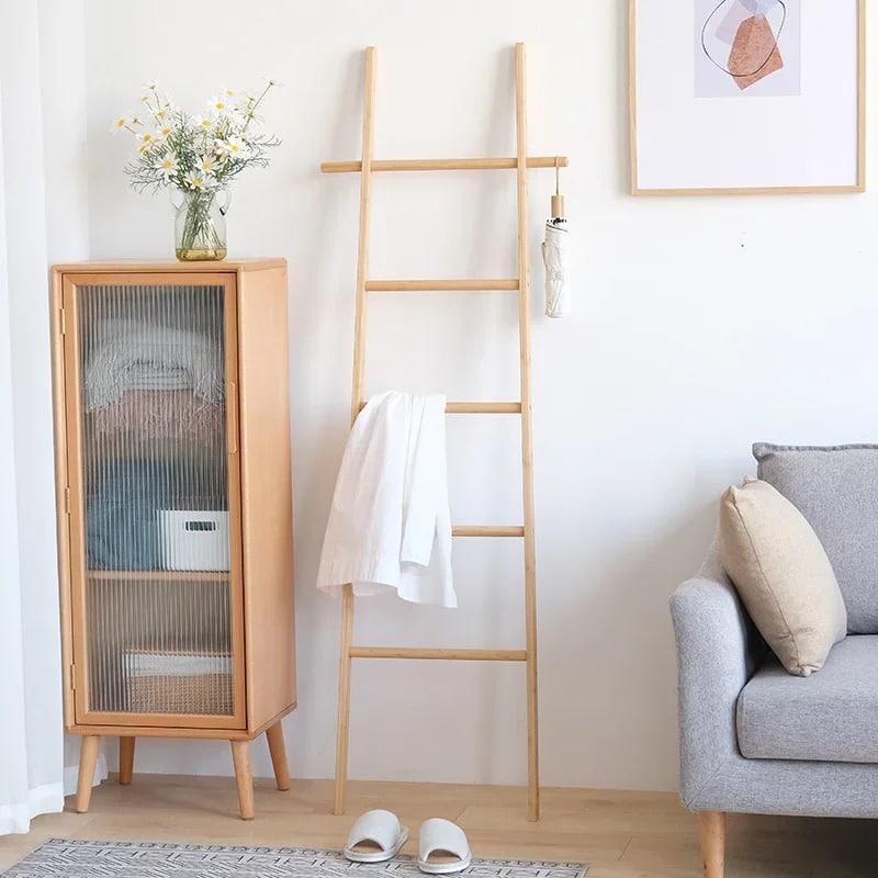 Hand-braided bamboo blanket ladder draped with a throw – shown in a room setting (2)