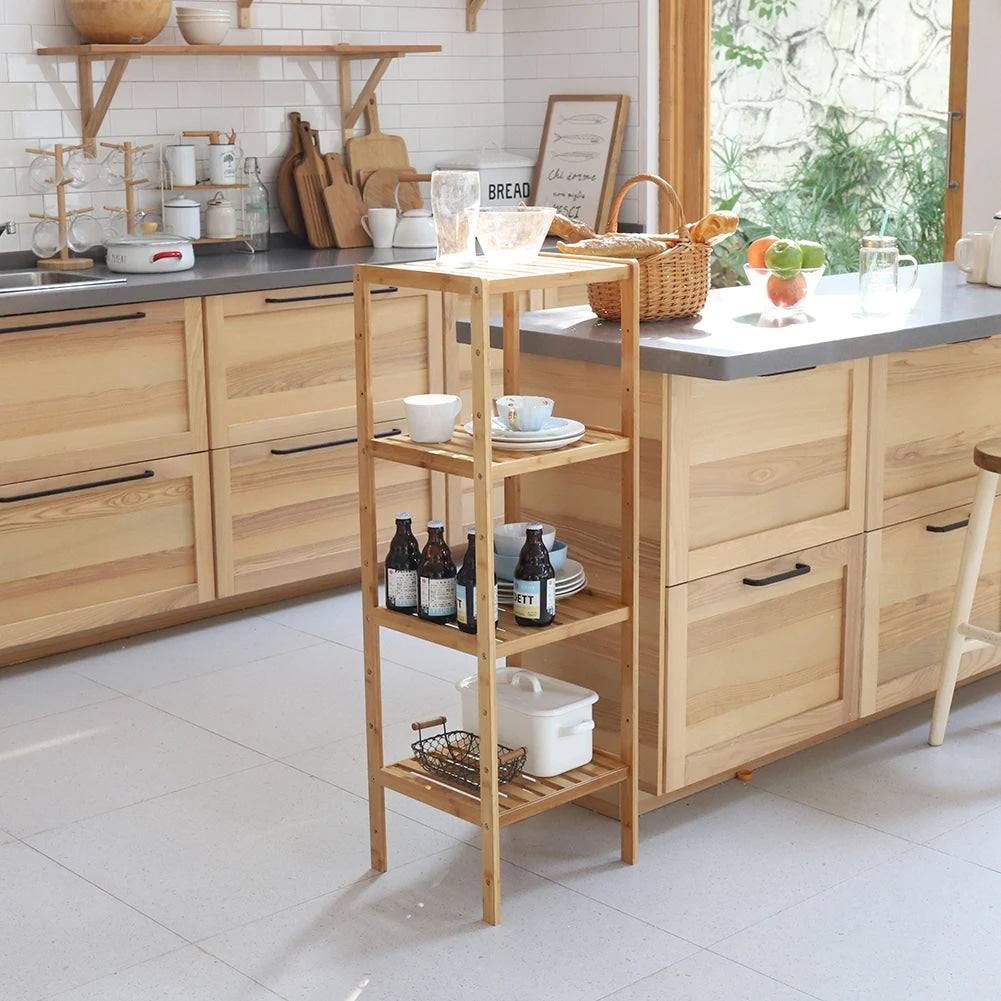 Four-tier bamboo shelf with books, plants and everyday objects – shown in a room setting