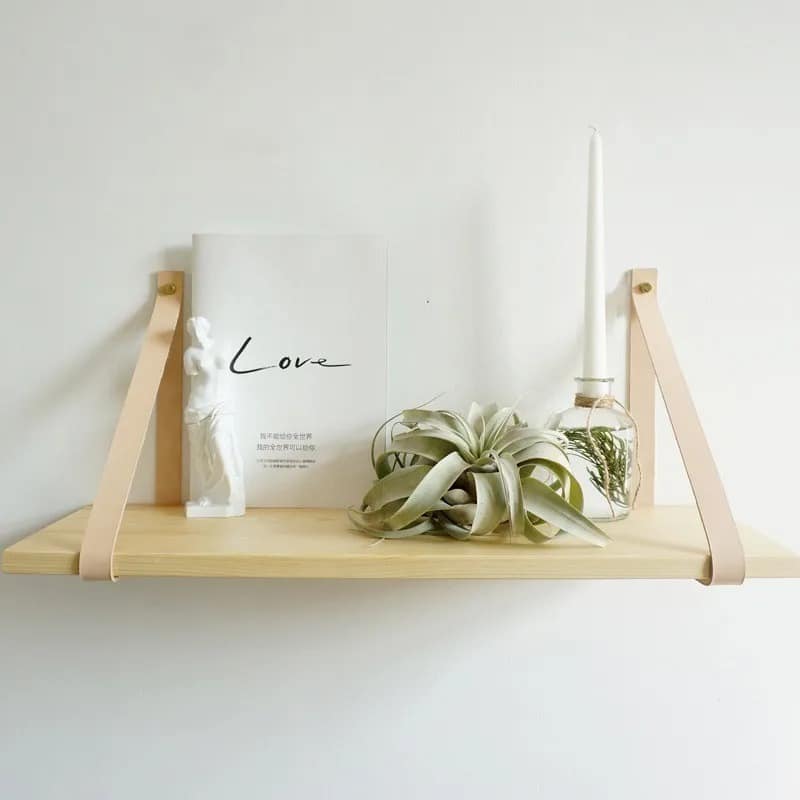 Natural wood shelf with a hand-woven rattan detail – shown in a room setting