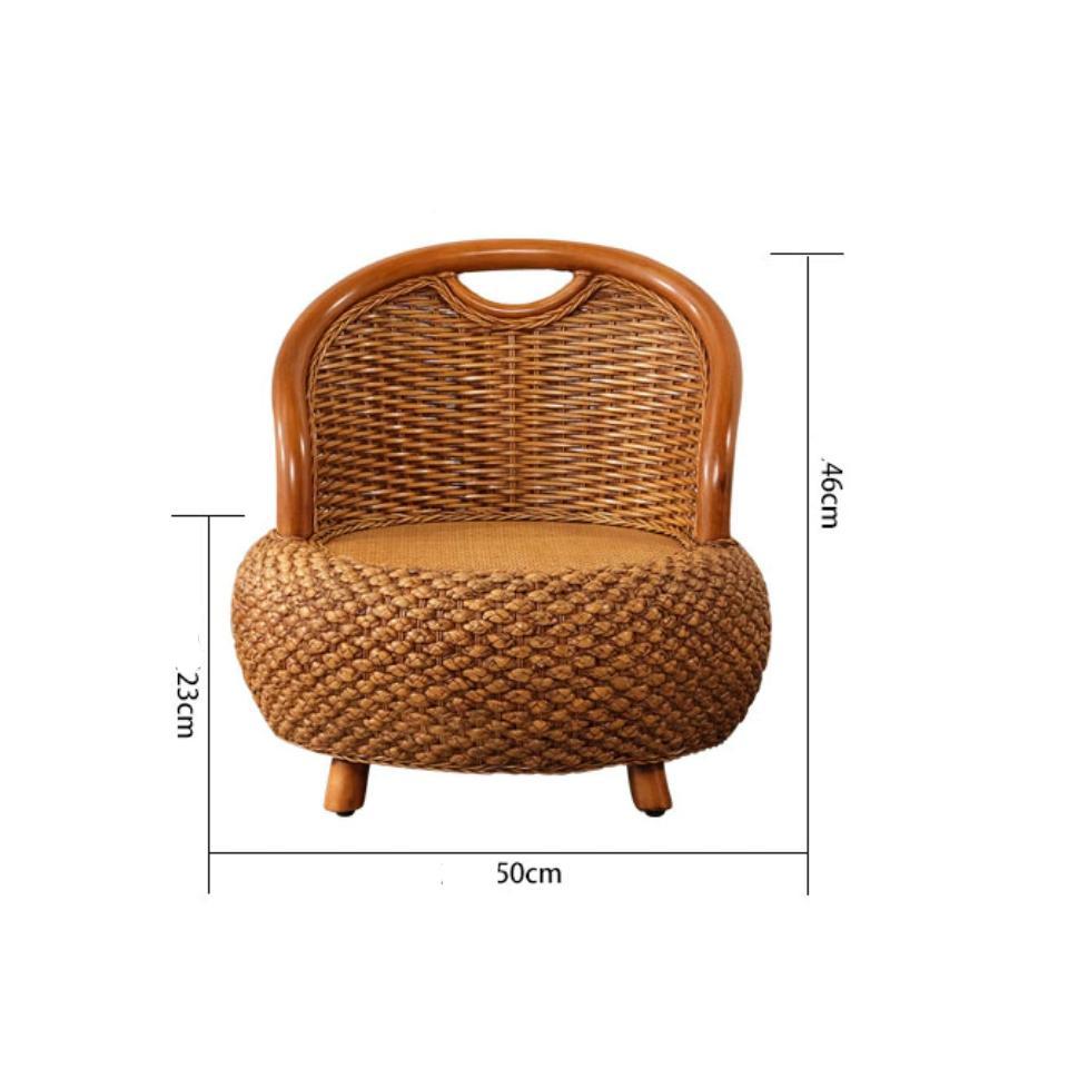 Small low brown rattan armchair with rounded shapes – dimensions diagram
