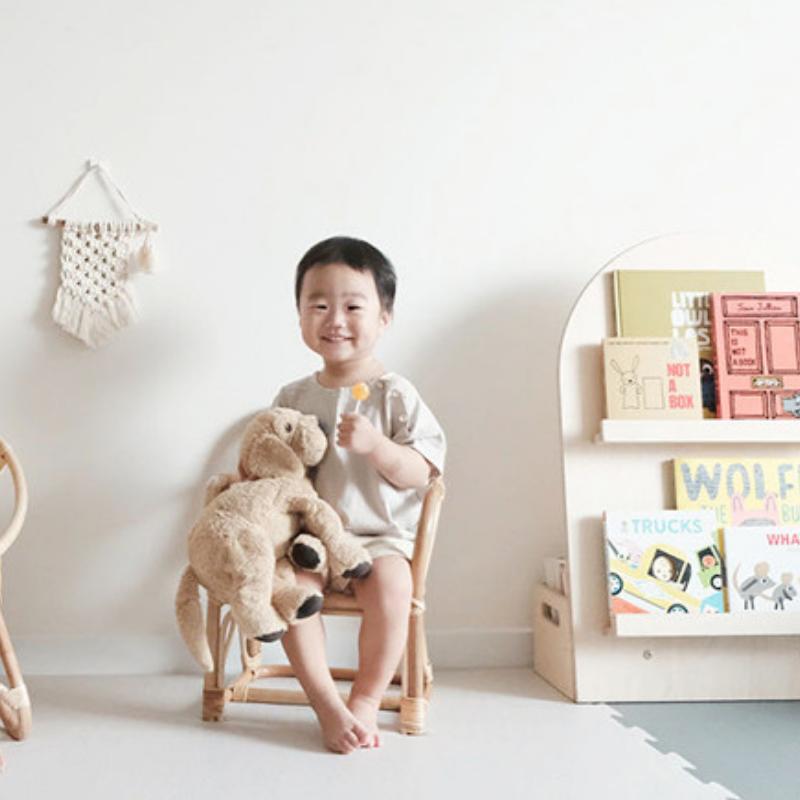 Square rattan kids mini armchair – shown in use