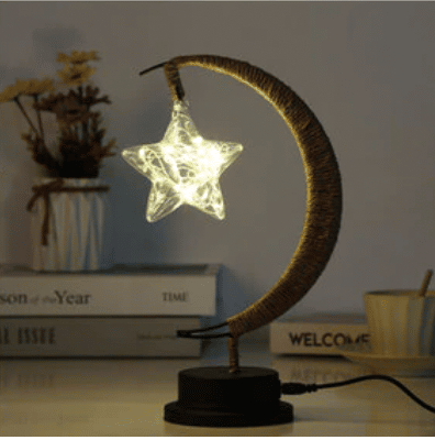 USB woven hemp crescent moon lamp with a star-shaped bulb – shown lit